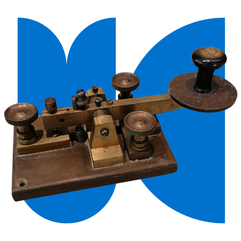 Stylized M O C letters with picture of Marconi radio equipment overlaid